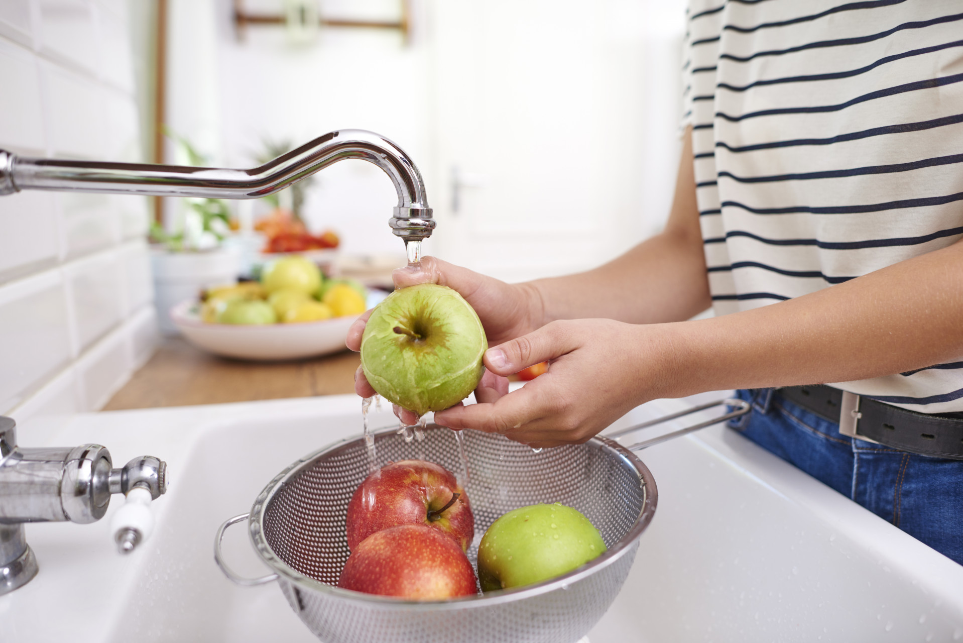 woman-washing-seasonal-fresh-apples